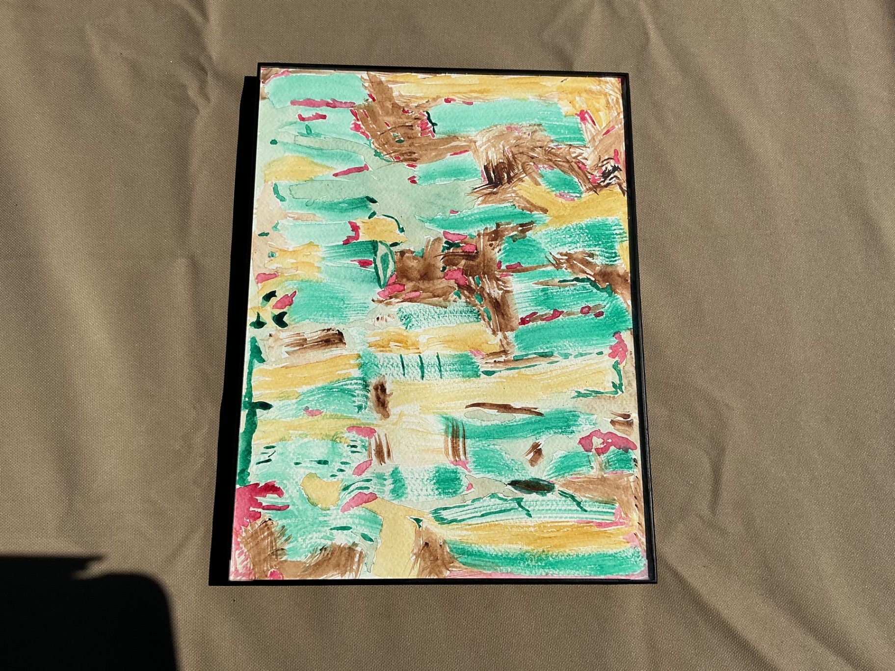Abstract watercolour of green, yellow, brown, and pink strokes