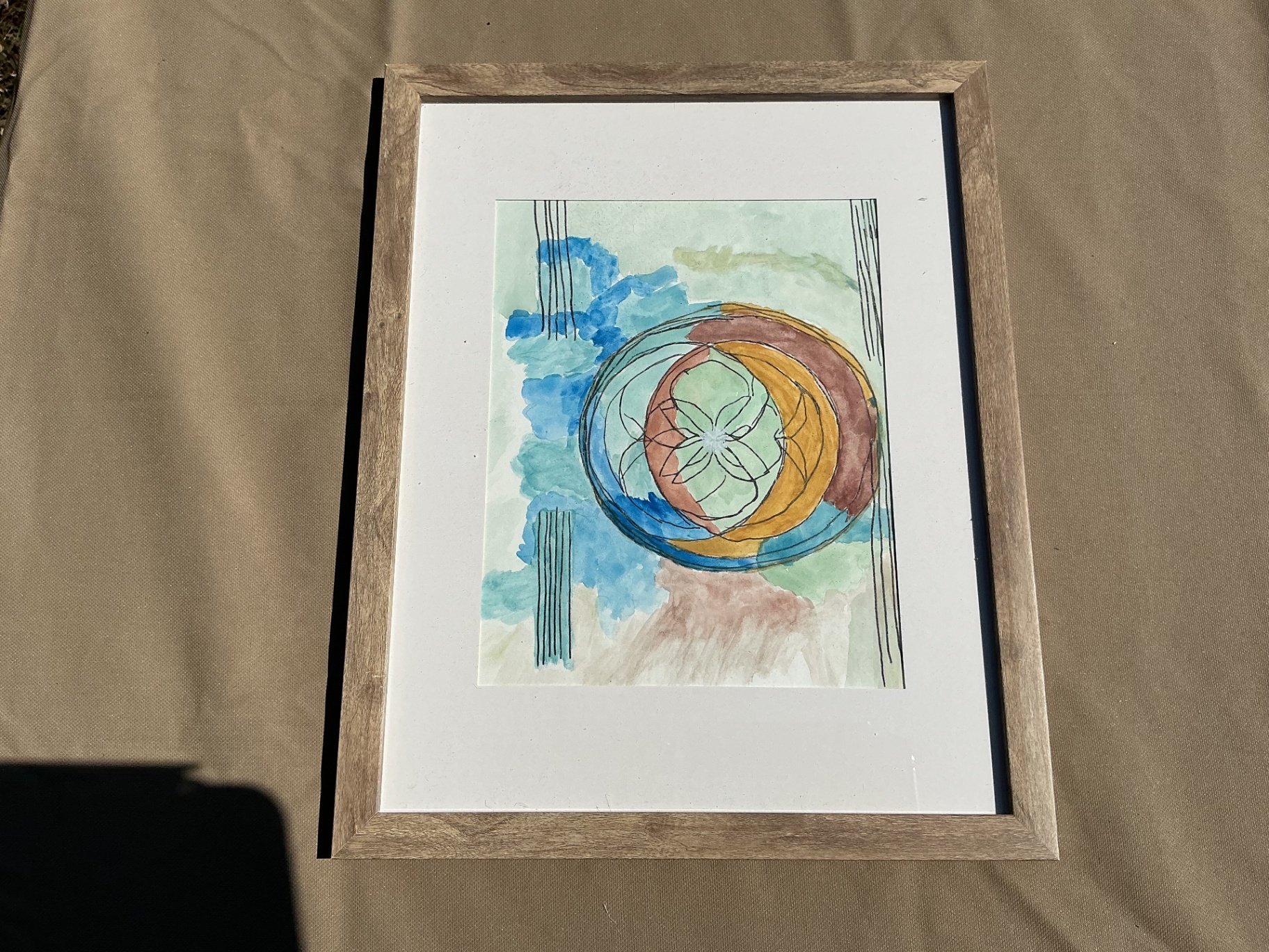 Watercolour study of concentric circles and a floral geometry