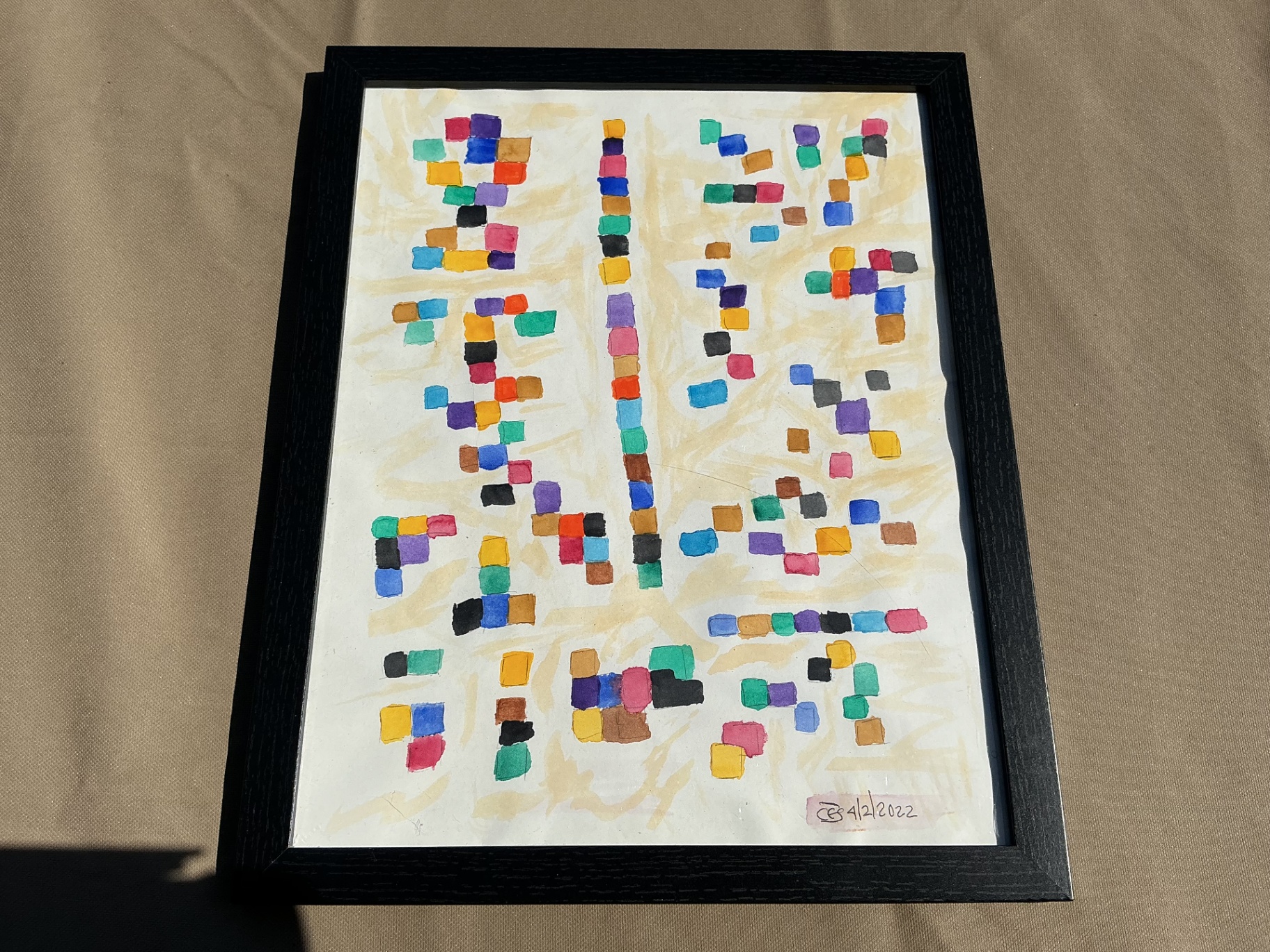 Abstract painting of multicolored blocks forming the words Bigger Picture